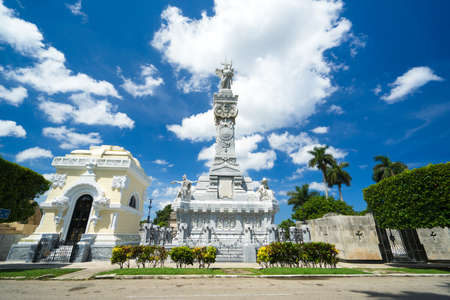HAVANA, CUBA - OCTOBER 03, 2016: The beautiful stone sculptures represented on a monument. The work of art, a family crypt at the public cemetery in the center of Havana in hot sunny summer dayのeditorial素材
