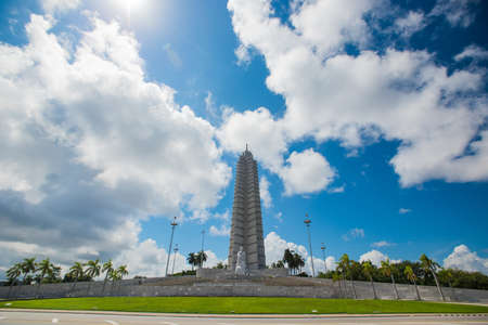 HAVANA, CUBA - OCTOBER 01, 2015: The beautiful stone sculpture and high building monument to Jose Marti placed in the central square of Havana in hot sunny summer dayのeditorial素材