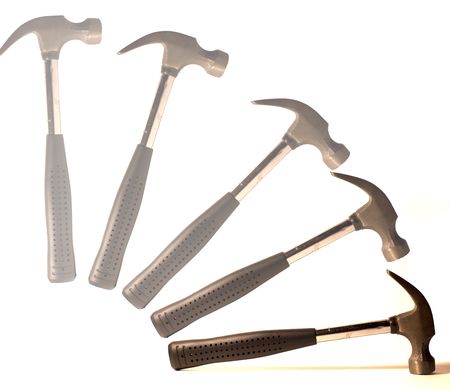 Hammer in motion with white backgrの写真素材