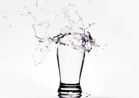 Exploding glass of waterの写真素材