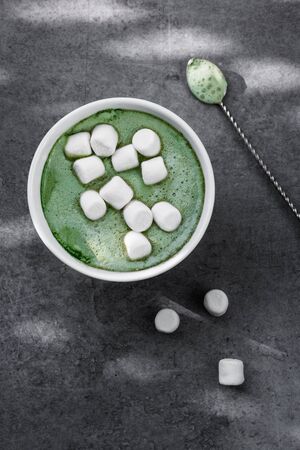 Matcha latte with marshmallowsの写真素材
