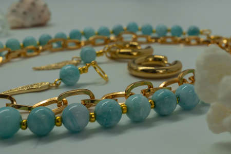 Handmade jewelry - golden beads. Macrophoto with studio light.の写真素材