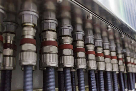 electrical cable glands connected to junction box.の写真素材