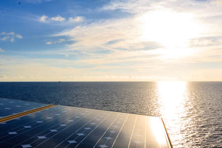 Solar cell panel or solar photovoltaic clean energy in the middle sea and blue sky for supply energy...