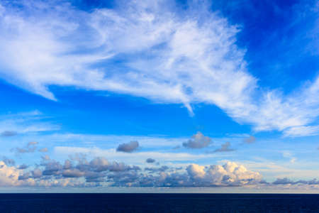 Blue sea and blue sky with white cloud.の写真素材