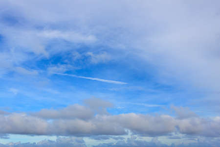 Blue sky with white cloud background.