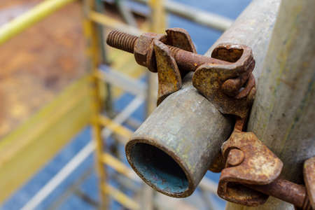 Scaffold double fix clamp and scaffold pipe are lock scaffold pipe together for build the temporary structure.の写真素材