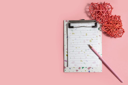 Happy Valentine's Day, February 14 with a notebook on pink