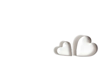 tin molds for making homemade cookies and gingerbread, on a white background. flat lay, copy spaceの写真素材