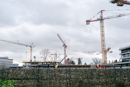 Construction cranes at the construction site