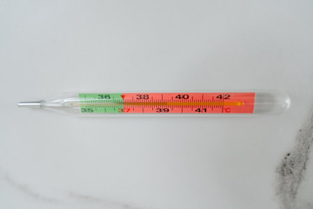 mercury glass thermometer with temp index of 39.3の写真素材