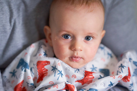 first complementary feeding of a baby, portraitの写真素材