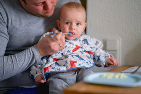 the first complementary feeding of a babyの写真素材