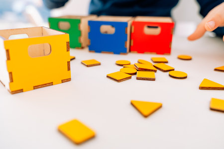 The little pupil arranges multicolored geometricの写真素材