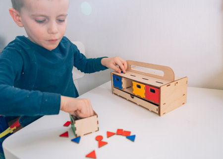A little pupil arranges multicolored geometricの写真素材