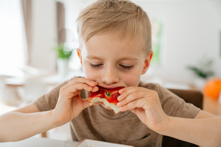 Child Enjoying Healthy Snackの写真素材
