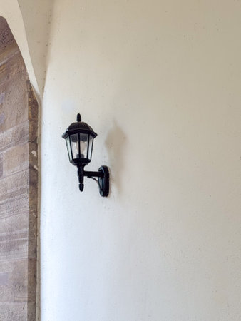 Classic Wall Mounted Lantern Light on Stone Wallの写真素材