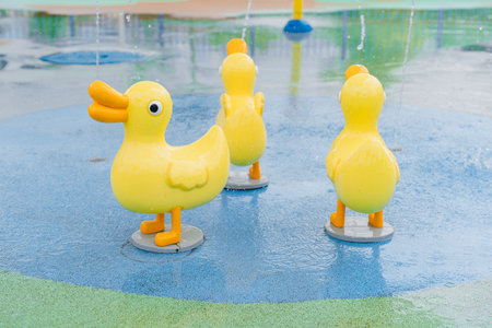 Colorful Rubber Ducks at Water Playground Fountainの写真素材