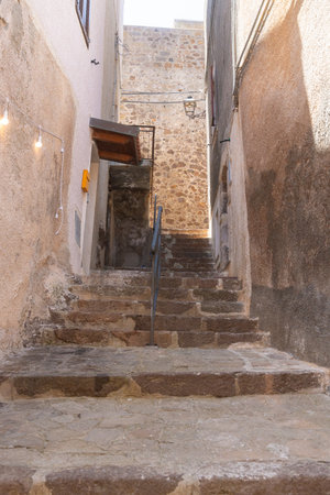 Rustic Stone Staircase in Narrow Alleyway Sceneの写真素材