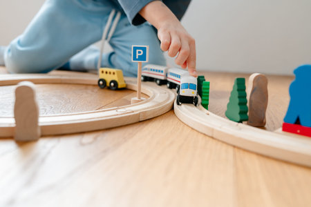 Minimalist kids play area with wooden railway setの写真素材