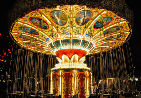 Empty chain carousel/colorful illuminated chain carouselのeditorial素材