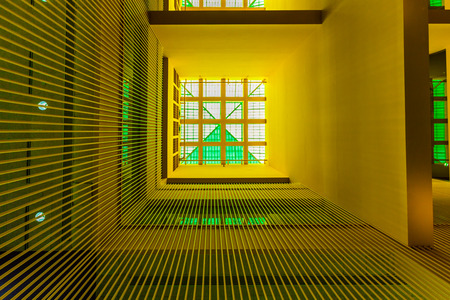 View of skylight window with green glass and yellow walls, modern interior architectureの写真素材