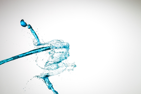 Water splash isolated on white backgroundの写真素材