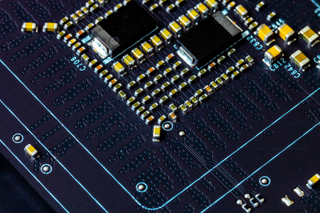 Computer circuit board showing the components  on a patternの写真素材