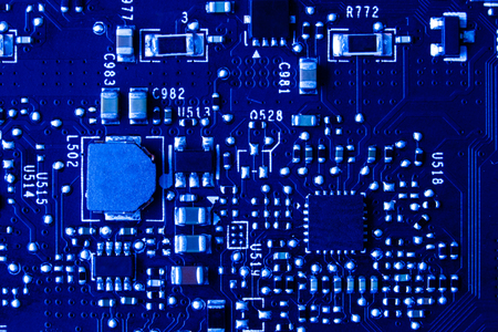 Computer circuit board showing the components  on a patternの写真素材
