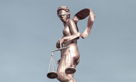 Lady justice blindfolded holding scales, Law and justice conceptの写真素材