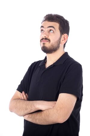 Young man looking up - isolated on whiteの写真素材