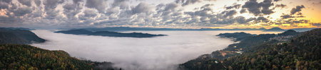 Natural scenery of sunrise and sea of clouds in Jingmai Mountain, Yunnanの写真素材