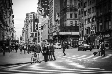 A city street view shot in the Flatiron District in Manhattan, New York City; black and white colortoneのeditorial素材