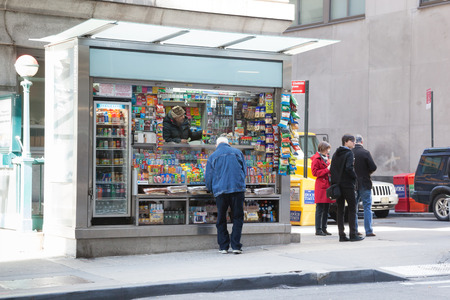 NEW YORK - APRIL 6:  A news stand is open for business in NYC's financial district.  Photo taken April 6, 2014.のeditorial素材