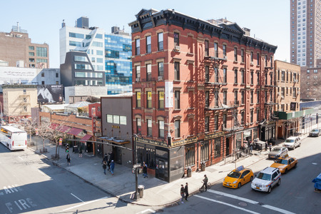 NEW YORK - APRIL 6:  People enjoy walking through Chelsea on a lovely spring day.  Photo taken April 6, 2014.のeditorial素材