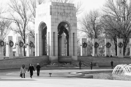 Washington DC - December 6, 2015:  Tourists visit the World War II Memorialのeditorial素材
