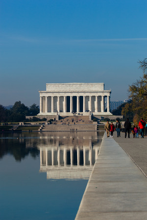 Washington DC - December 6, 2015:  The Lincoln Memorial is reflected in the reflection pool on a bright, sunny dayのeditorial素材