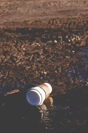 FORT LEE, NEW JERSEY - January 1, 2017: A Starbucks coffee cup litters the ground at Fort Lee Historic Parkのeditorial素材