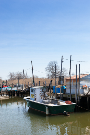 BELFORD, NEW JERSEY - April 11, 2017: Commercial fishing boats are docked at the Belford Seafood Cooperativeのeditorial素材