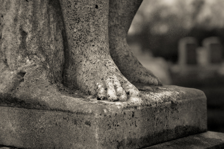 Details of the feet of a statue at Kingston Cemetery in New Jersey. Photo taken in April, 2017.のeditorial素材