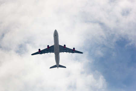 SEWAREN, NEW JERSEY - April 5, 2017: A large airliner flies over Sewaren in early spring.のeditorial素材