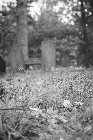 Old tombstones in a colonial cemetery in Metuchen, New Jersey. This cemetery predates the Revolutionary War.の写真素材