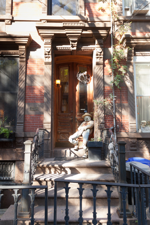 HOBOKEN, NEW JERSEY - October 27, 2017: The beautiful brownstones along Garden Street are decorated...