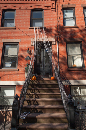 HOBOKEN, NEW JERSEY - October 27, 2017: The beautiful brownstones along Garden Street are decorated for Halloweenのeditorial素材