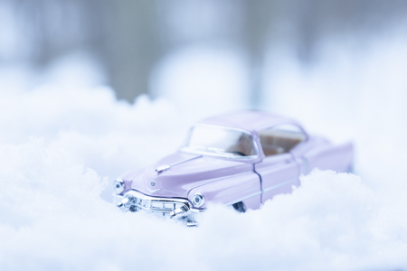 WOODBRIDGE, NEW JERSEY - March 14, 2017: A diecast toy Cadillac in the snowのeditorial素材