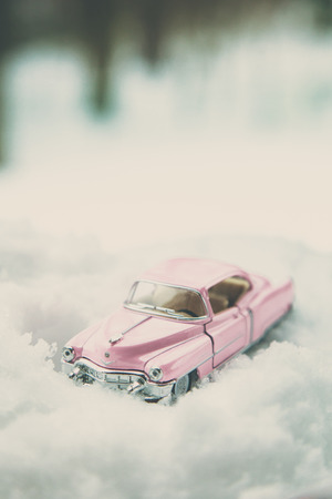 WOODBRIDGE, NEW JERSEY - March 14, 2017: A diecast toy Cadillac in the snowのeditorial素材