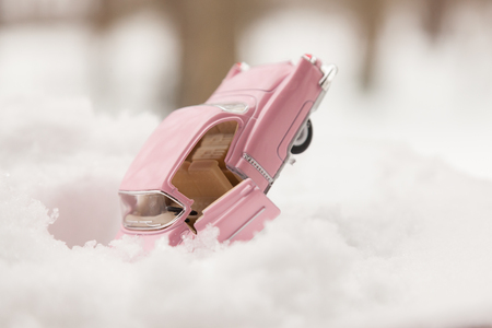 WOODBRIDGE, NEW JERSEY - March 14, 2017: A diecast toy Cadillac in the snowのeditorial素材