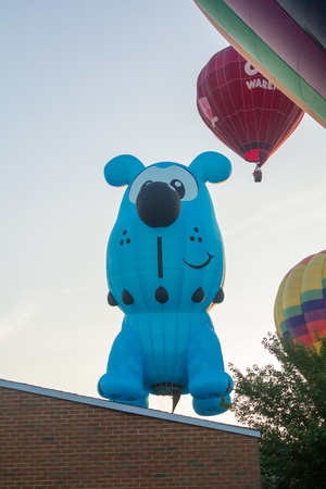 BRANCHBURG, NEW JERSEY - July 28, 2018: Hot air balloons land next to the Midland School after launching at the Quick Chek Festival of Ballooning.のeditorial素材