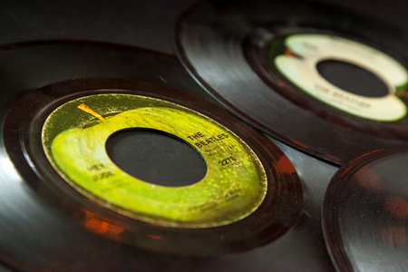 WOODBRIDGE, NEW JERSEY - October 11, 2018: A collection of 1960s Beatles 45 speed records on the Apple Records labelのeditorial素材