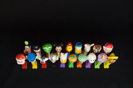 WOODBRIDGE, NEW JERSEY / UNITED STATES - January 16, 2020: A variety of Pez dispensers are lined up...